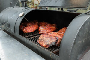 meat on smoker grill