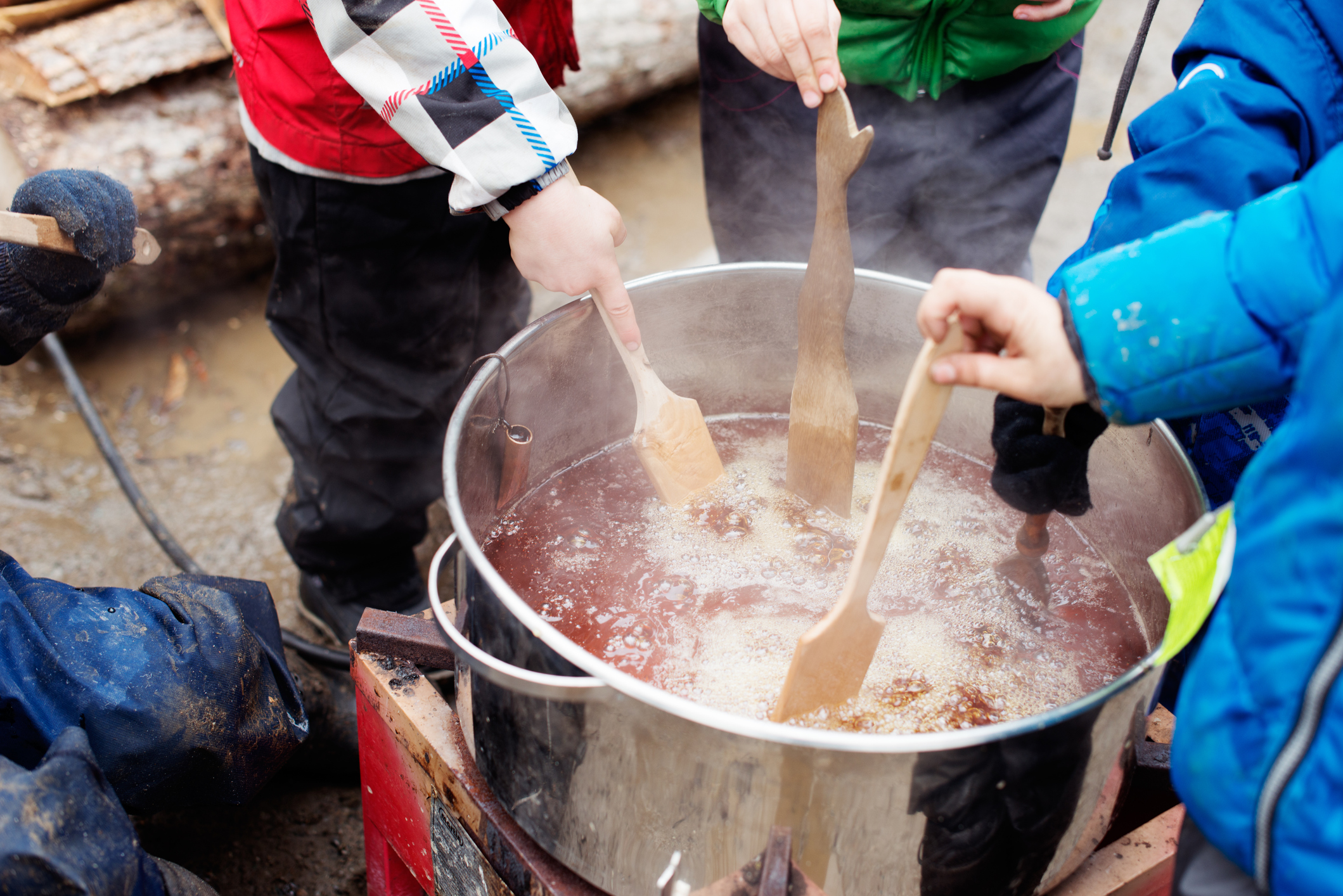 Maple Syrup industry time with two children tasting maple syrup Blain