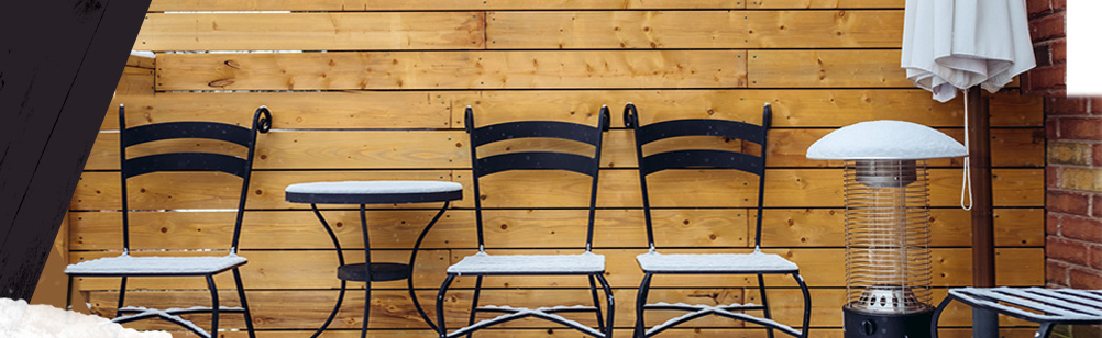 outdoor patio chairs covered in snow