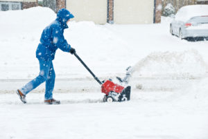 Man using a Snow Blower