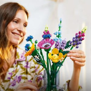 woman holding lego flower bouquet