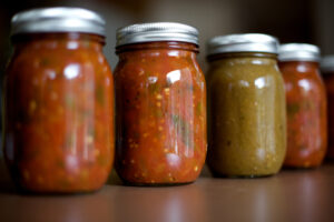 jars of salsa on a countertop
