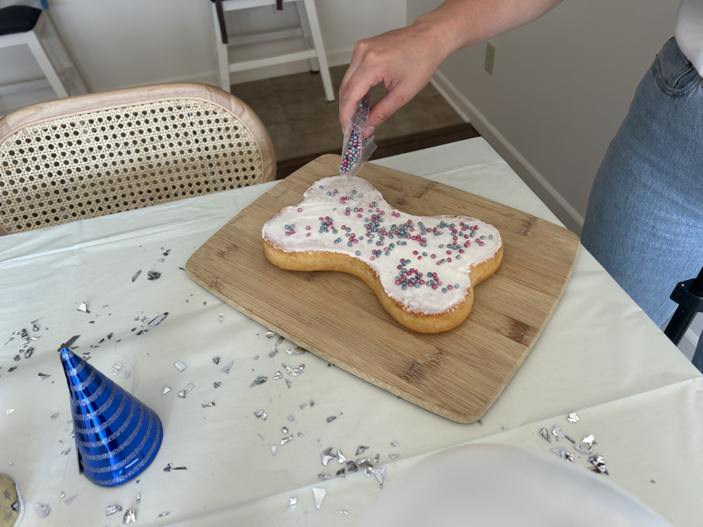 adding sprinkles to cake