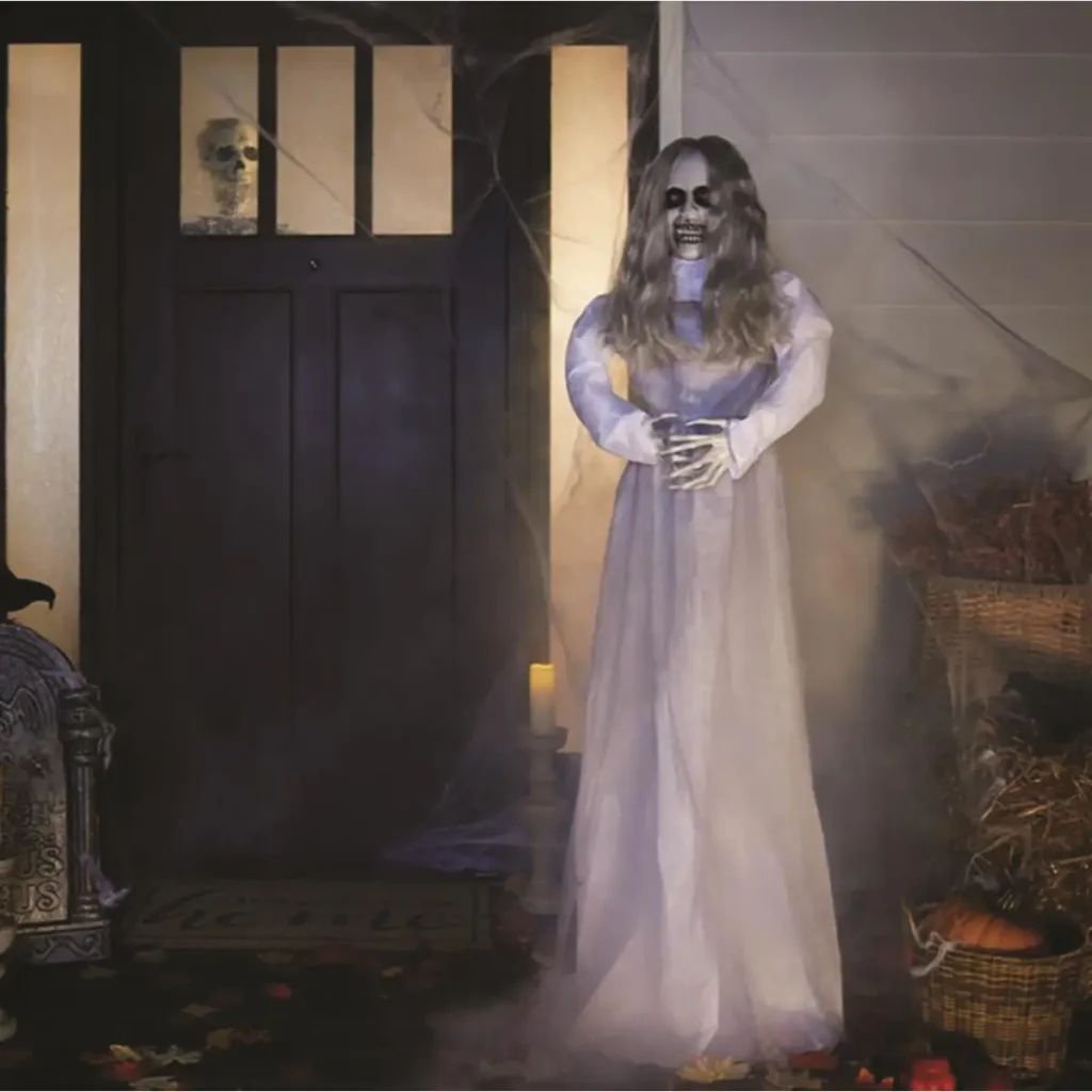 creepy ghost Halloween decoration next to front door