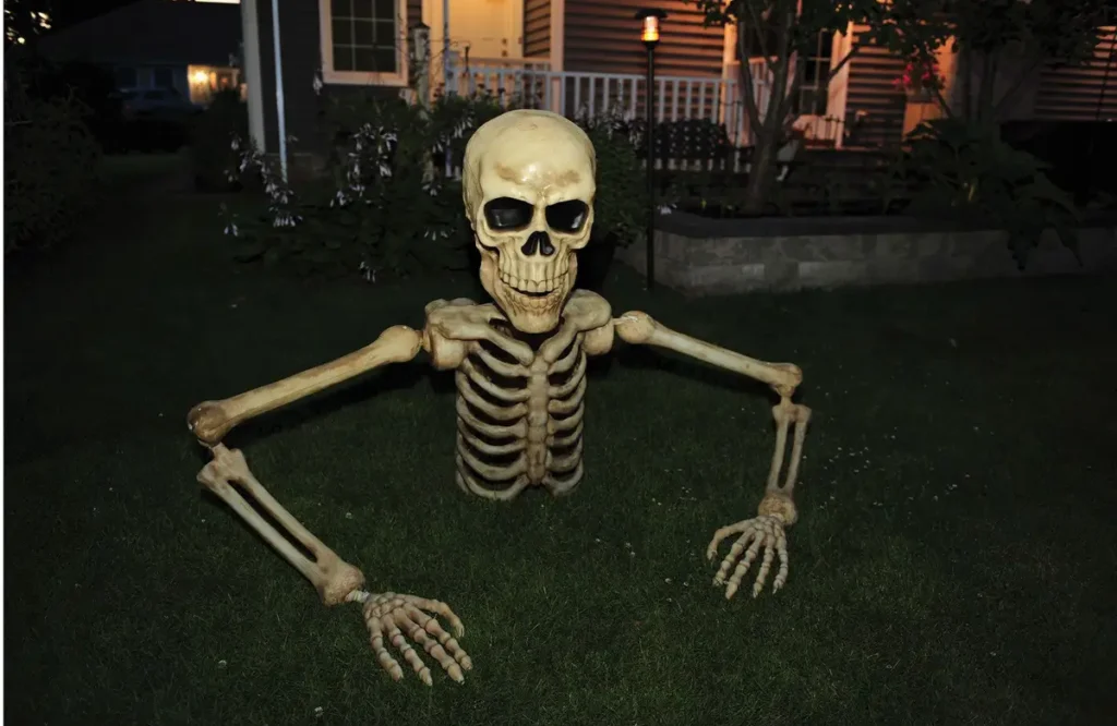 skeleton decoration in front yard
