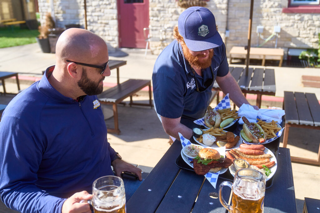Trevor getting served food at Kegel's Inn