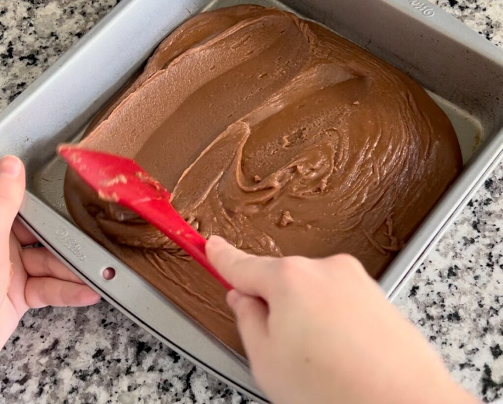 spreading mixture in baking pan